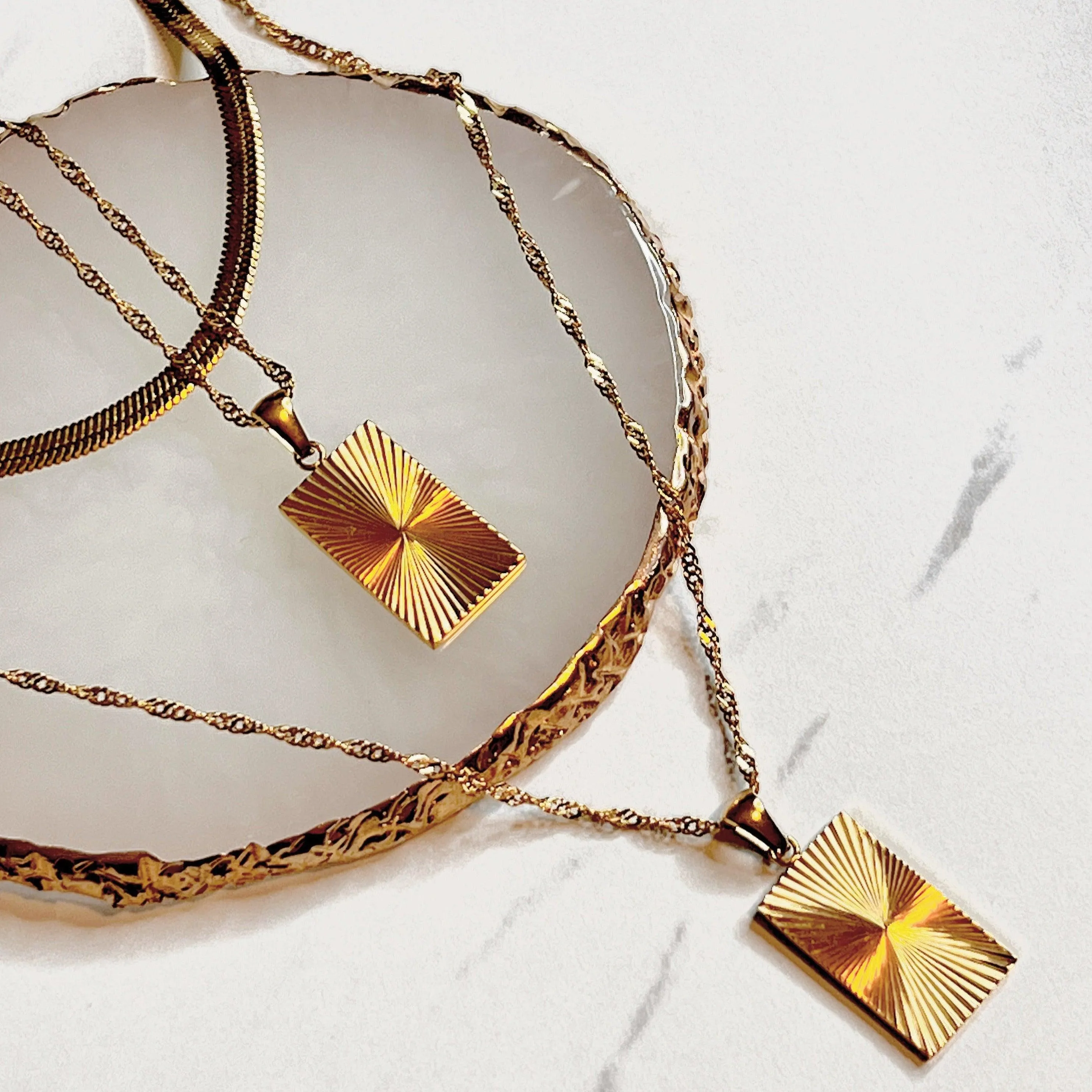Taylor Sunburst Charm Necklace